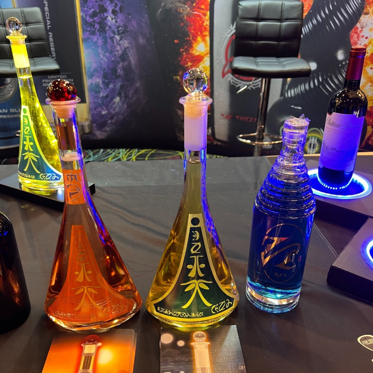 5 bottles of liquor on a table